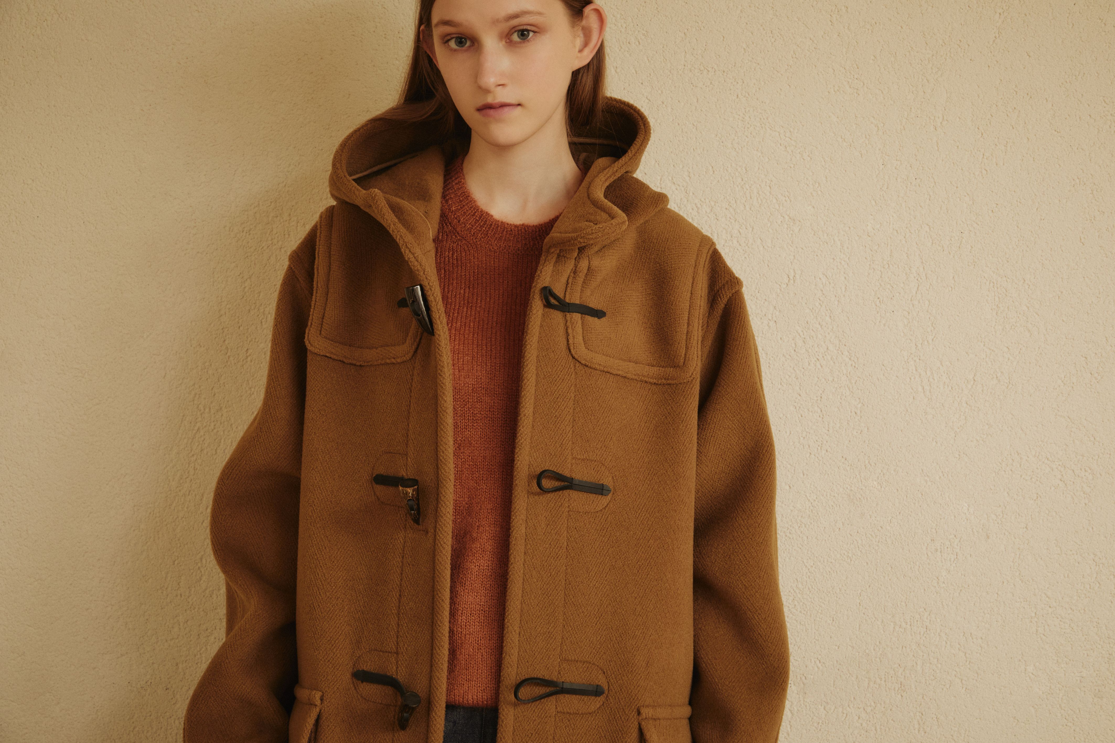 Model wearing a camel GLENMORE duffle coat